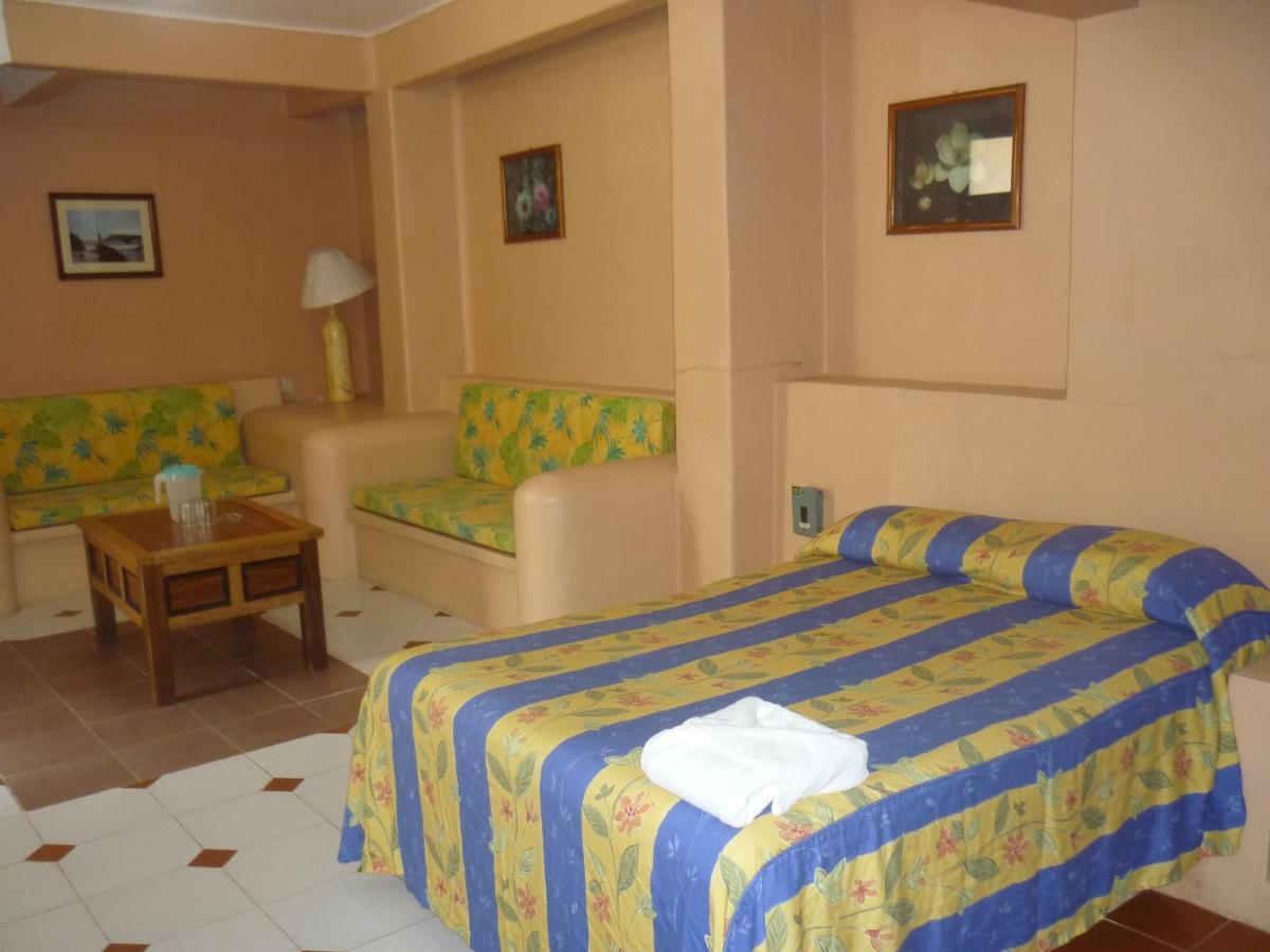 Rincon Del Pacifico Hotel ปูแอร์โตเอสกอนดิโด ห้อง รูปภาพ