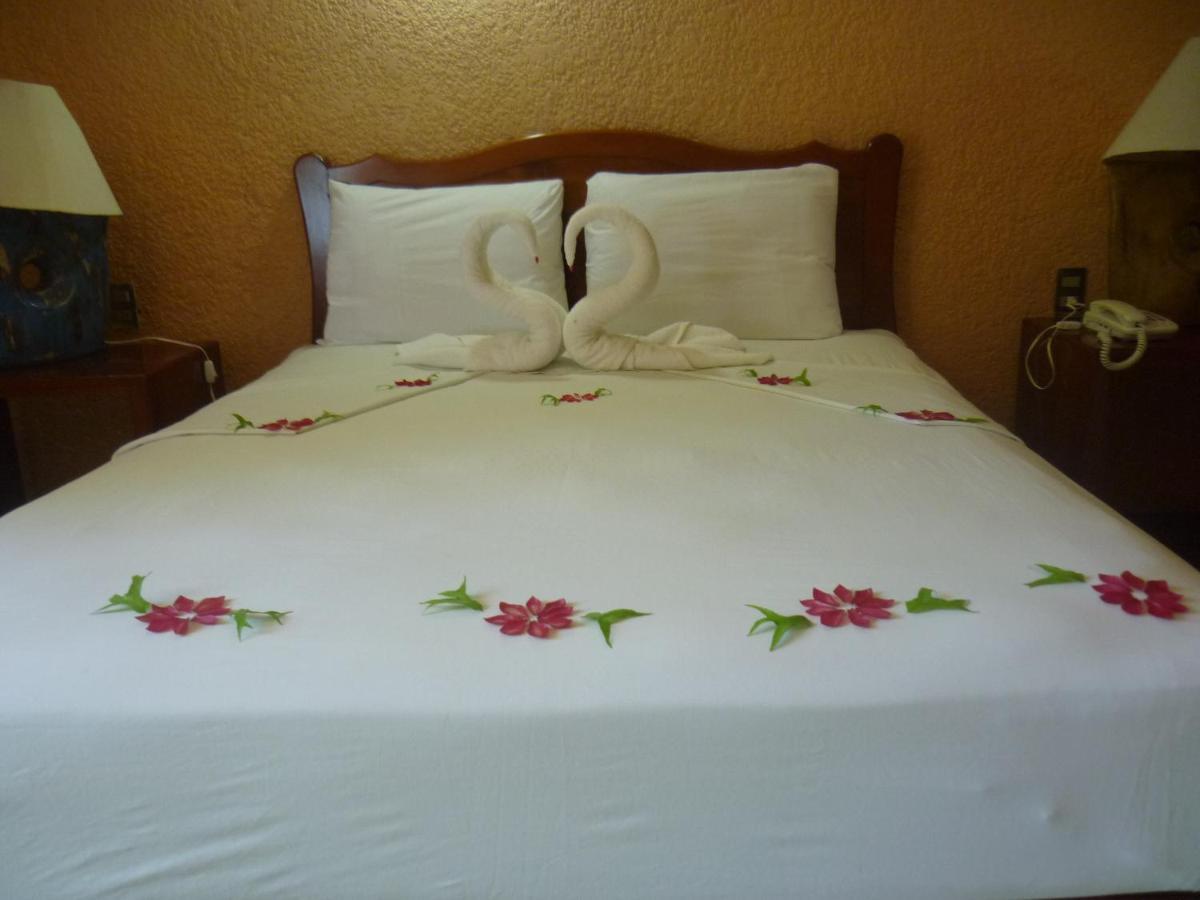 Rincon Del Pacifico Hotel ปูแอร์โตเอสกอนดิโด ห้อง รูปภาพ