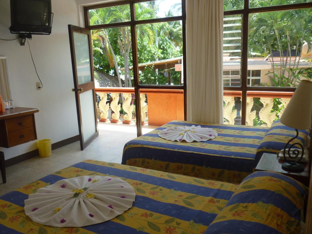 Rincon Del Pacifico Hotel ปูแอร์โตเอสกอนดิโด ห้อง รูปภาพ